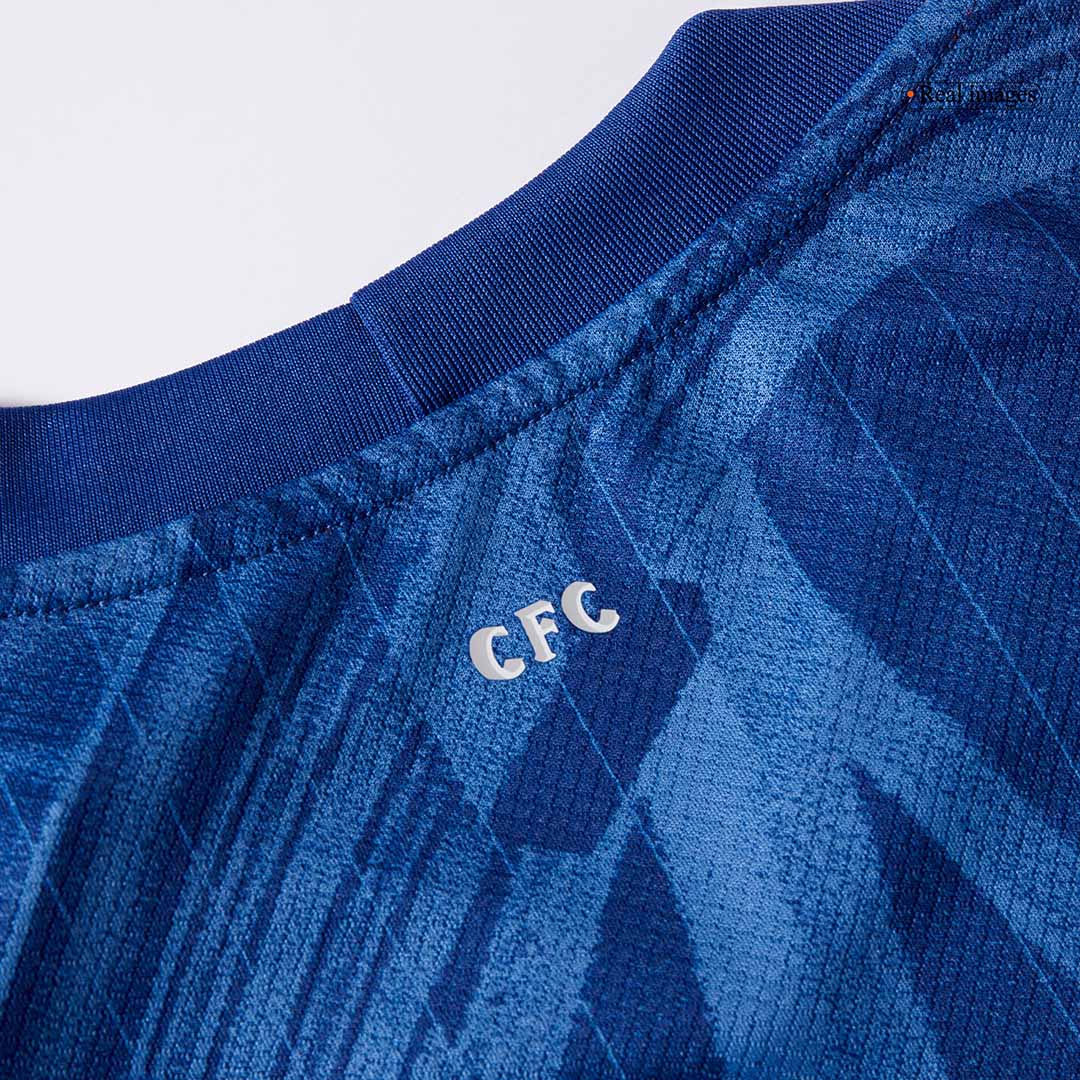 Maglia Replica Chelsea Casa WORLD CHAMPIONS #25 Uomo 2025/26